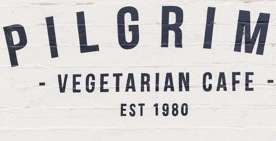 Change of use from a residential flat to a restaurant with signage